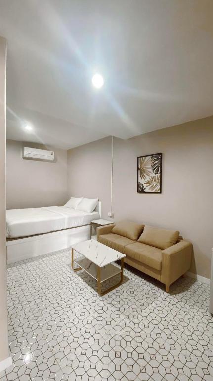 Posezení v ubytování Juni House Chumphon