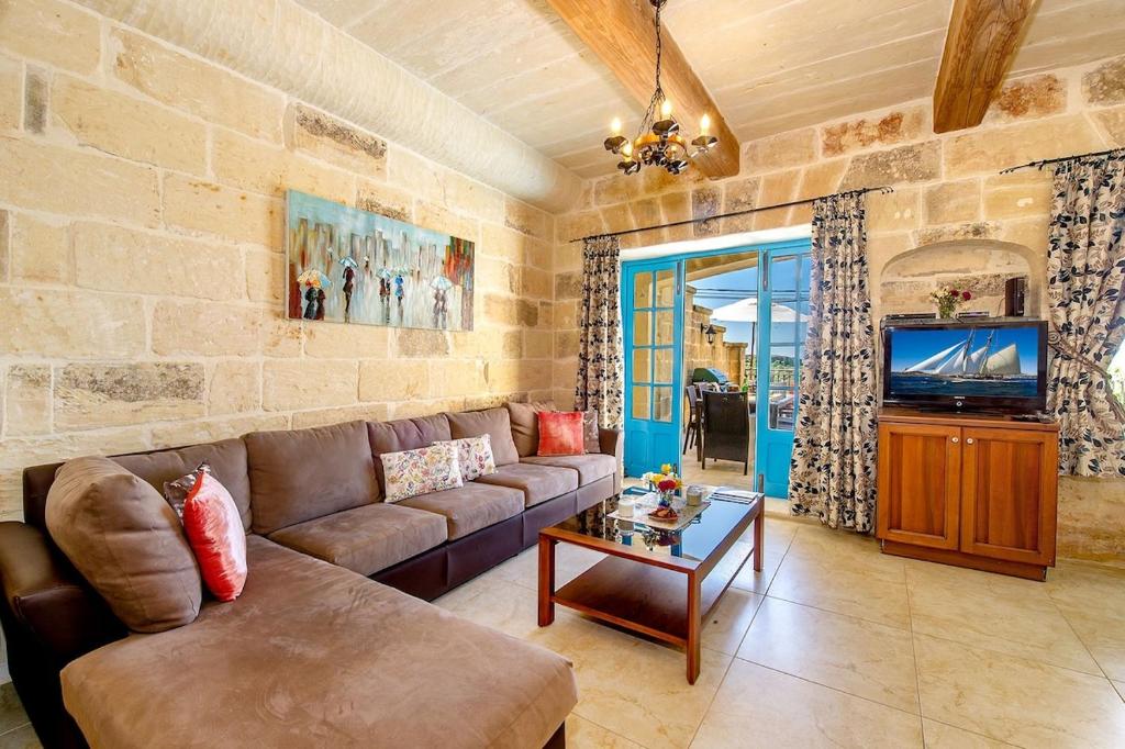 TV a/nebo společenská místnost v ubytování Ta Rena Holiday Home