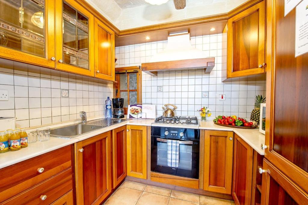 Kuchyň nebo kuchyňský kout v ubytování Ta Rena Holiday Home