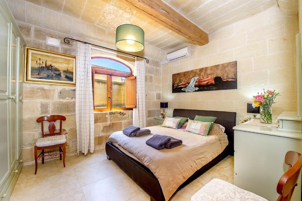 Postel nebo postele na pokoji v ubytování Ta Rena Holiday Home