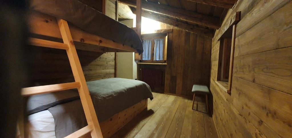 Postel nebo postele na pokoji v ubytování Casa Vacanza I Foresti Ex Scuola