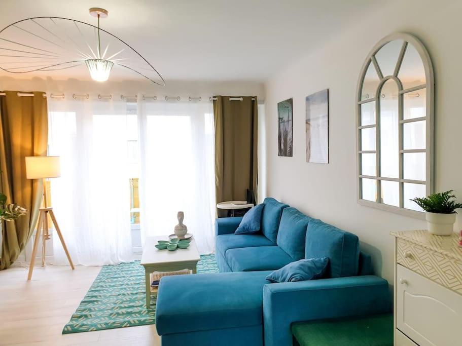 Część wypoczynkowa w obiekcie Cosy Summer 2CH - Parc Expo - 2 Balcons & stationnement gratuit
