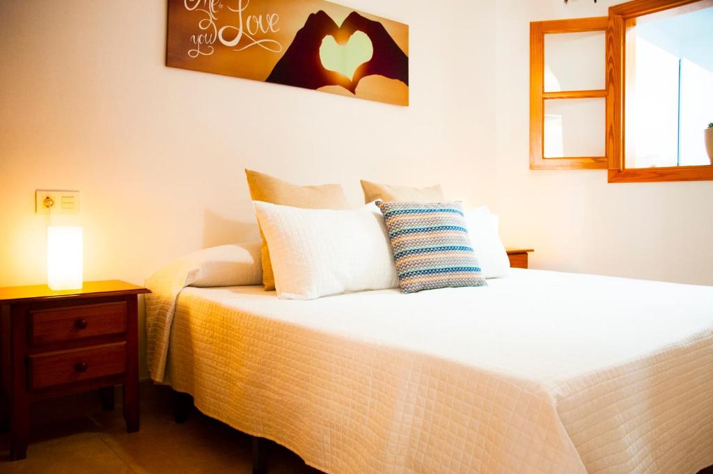 Postel nebo postele na pokoji v ubytování La Concha Beach apartament