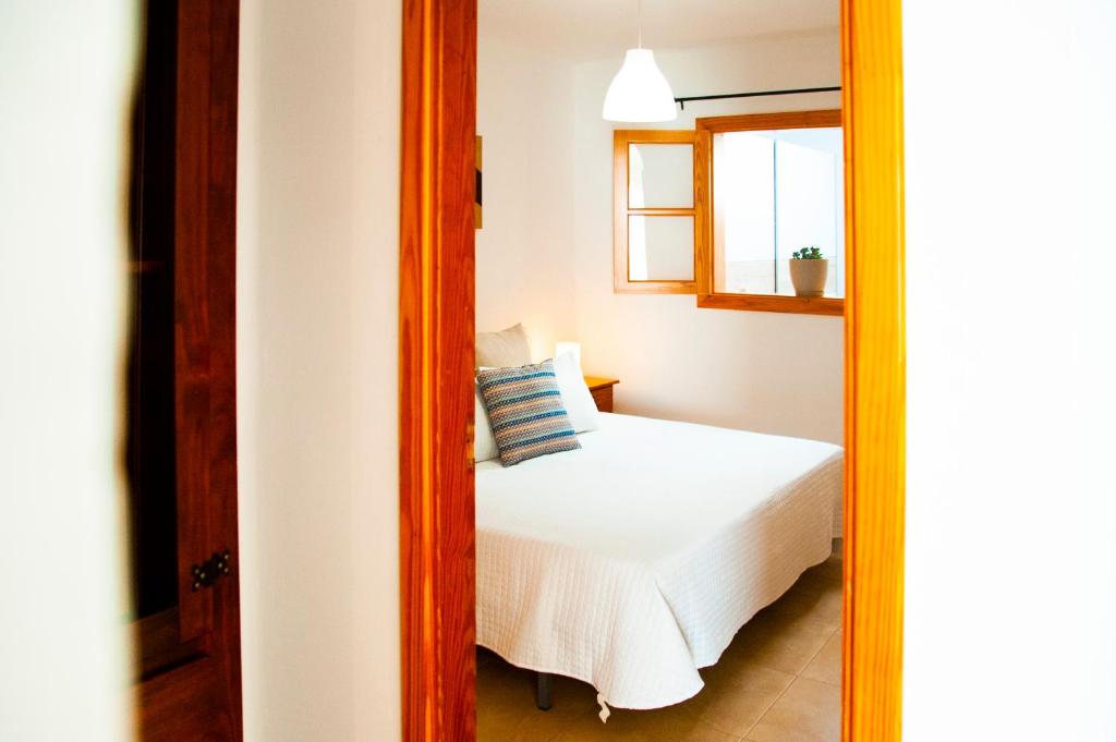 Postel nebo postele na pokoji v ubytování La Concha Beach apartament