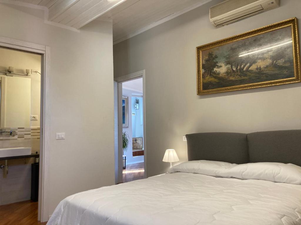 Ένα ή περισσότερα κρεβάτια σε δωμάτιο στο la suite di via Mazzini