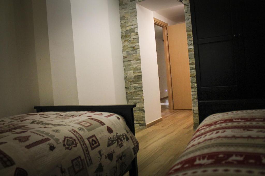 Postel nebo postele na pokoji v ubytování La Casa dei Gatti