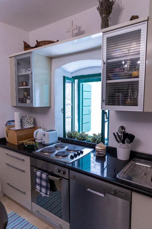 Kuchyň nebo kuchyňský kout v ubytování House Beatrix