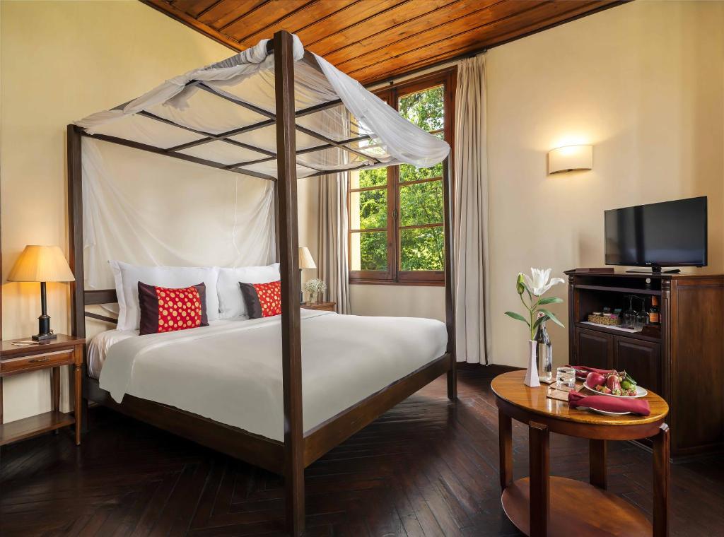 Postel nebo postele na pokoji v ubytování Ana Mandara Villas Dalat Resort & Spa