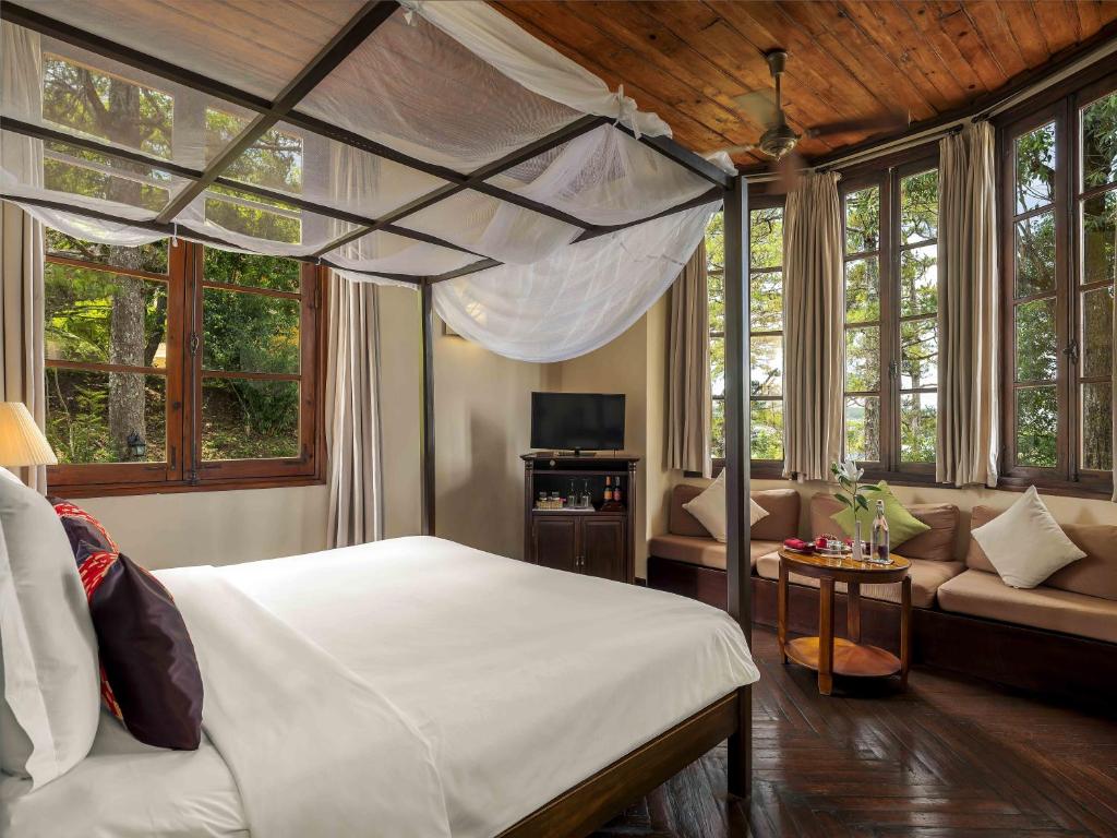 Postel nebo postele na pokoji v ubytování Ana Mandara Villas Dalat Resort & Spa