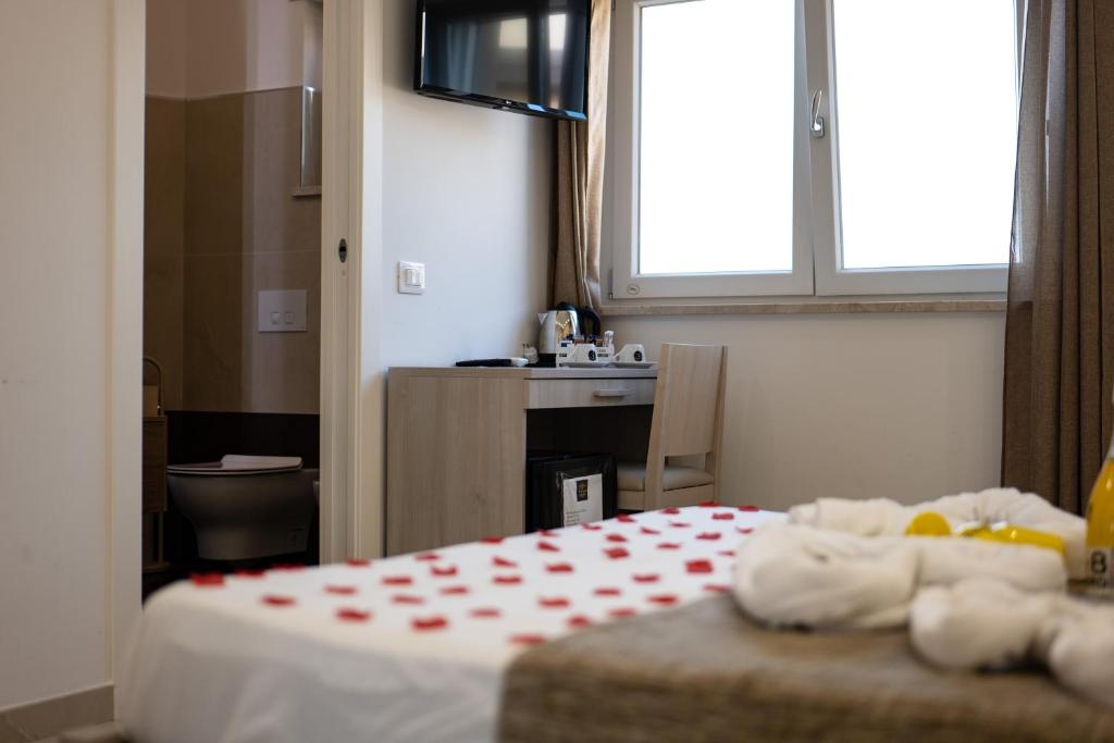 Postel nebo postele na pokoji v ubytování B&B Jerocades