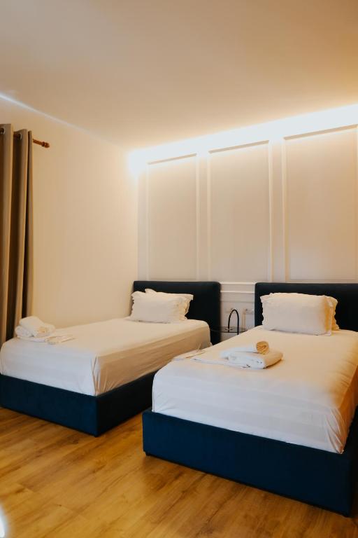 Uma cama ou camas num quarto em Sharm Hotel Luxury
