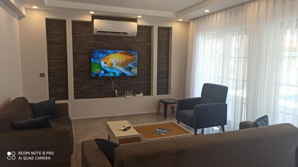 Posezení v ubytování Villa ERTUNÇ - Kaliteli Tatilin Adresi