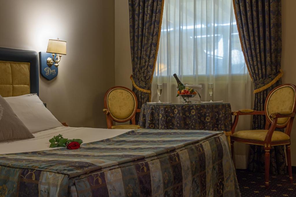 Postel nebo postele na pokoji v ubytování Hotel Motel Del Duca