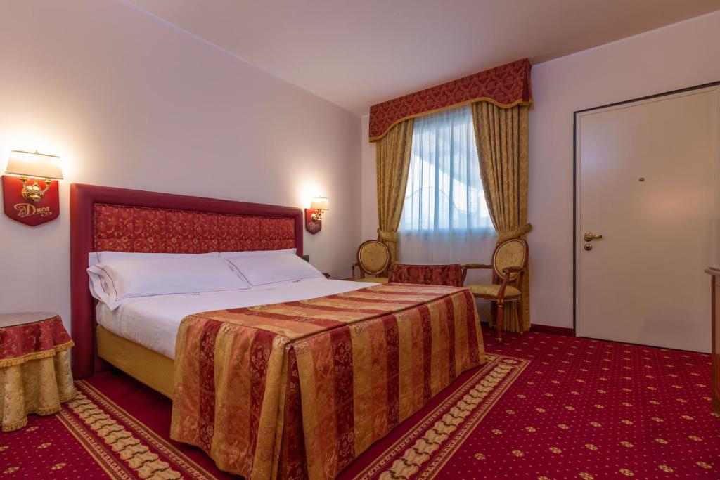 Postel nebo postele na pokoji v ubytování Hotel Motel Del Duca
