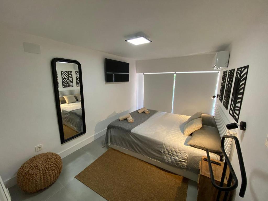 Posteľ alebo postele v izbe v ubytovaní DUPLEX TORREMOLINOS 2 DORM / 2 WC
