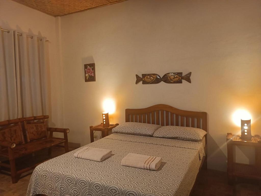 Postel nebo postele na pokoji v ubytování Villa Skanderbeg Guest House