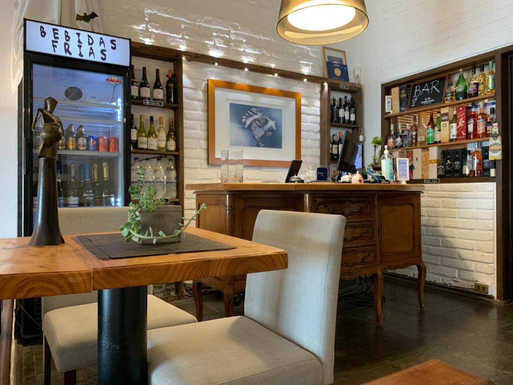 El salón o zona de bar de Laura del Mar Hotel Boutique