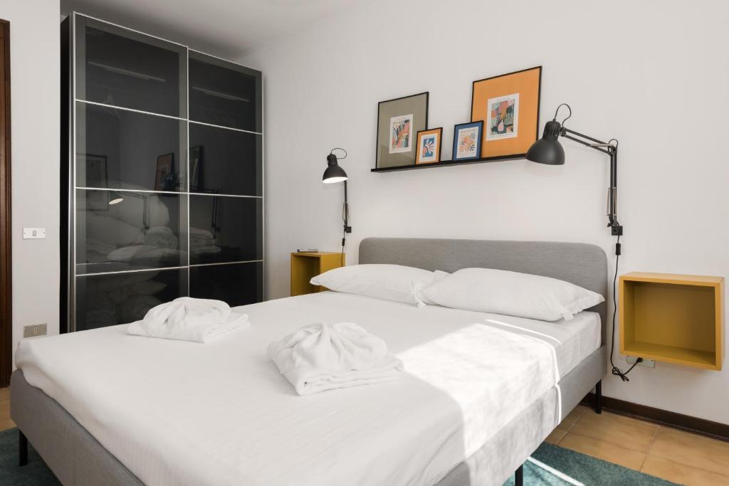 Posteľ alebo postele v izbe v ubytovaní Flats4rent Sabotino
