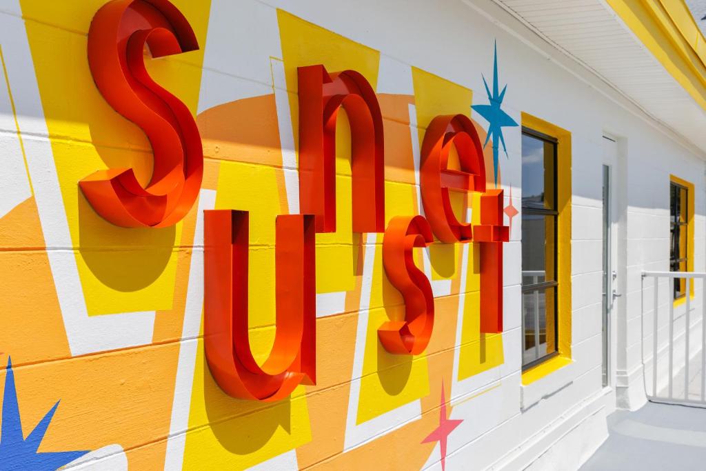 a mural on the side of a building at Sunset Inn and Cabanas in St. Pete Beach
