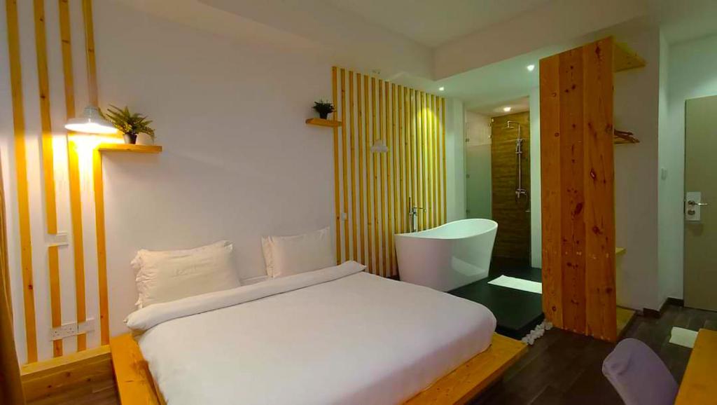 Postel nebo postele na pokoji v ubytování Portia Hotel & Spa