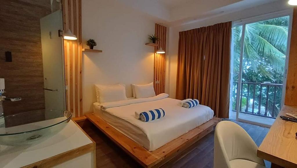 Postel nebo postele na pokoji v ubytování Portia Hotel & Spa