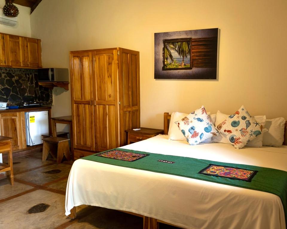 Postel nebo postele na pokoji v ubytování Hotel Santa Catalina Panamá