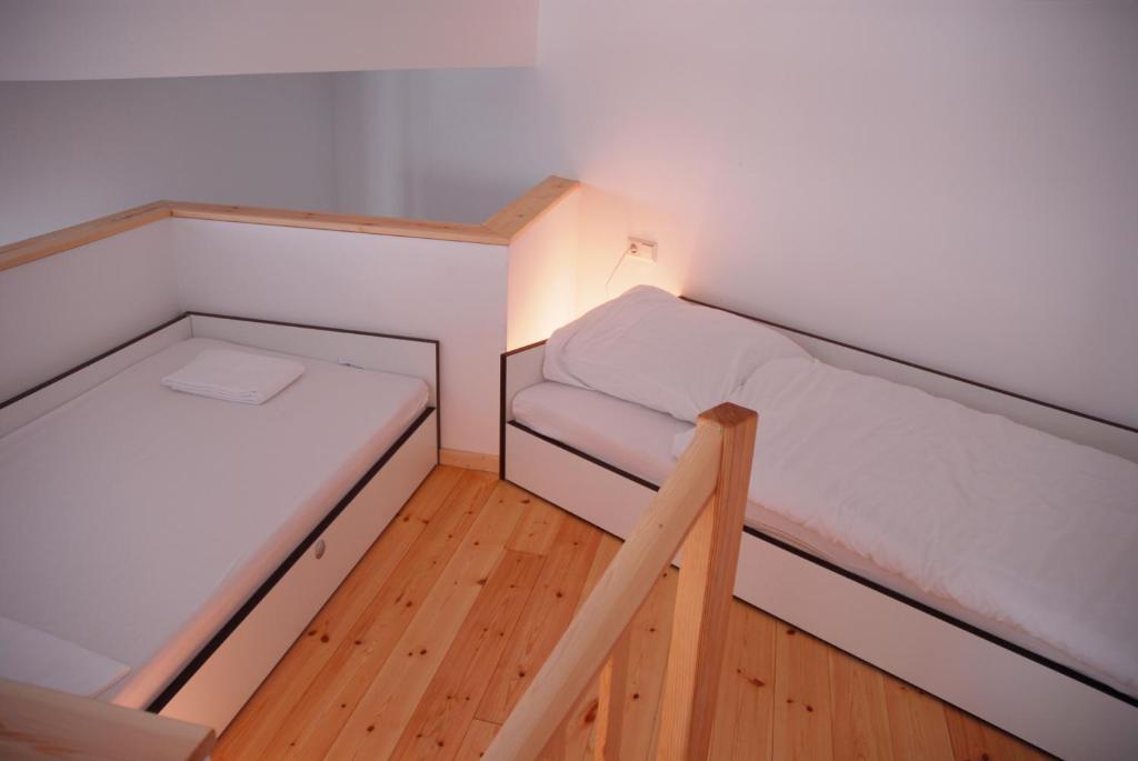 Postel nebo postele na pokoji v ubytování GLS Studio Hotel Berlin