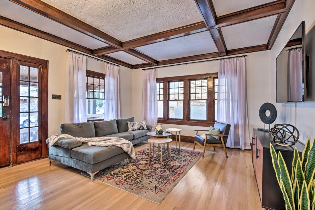 a living room with a couch and a table at El Paso Historic Craftsman House Less Than 1 Mi to Dtwn! in El Paso