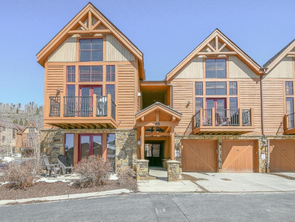 a large wooden house with a balcony at Antlers Gulch 502 in Keystone