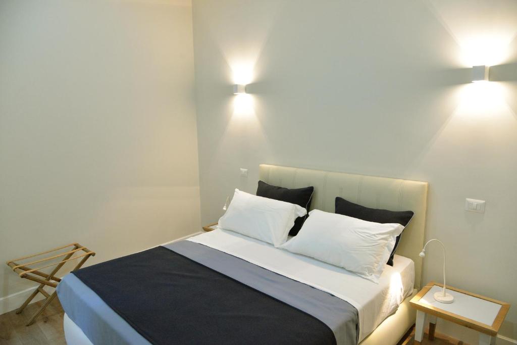 Кровать или кровати в номере Little Rose Residence