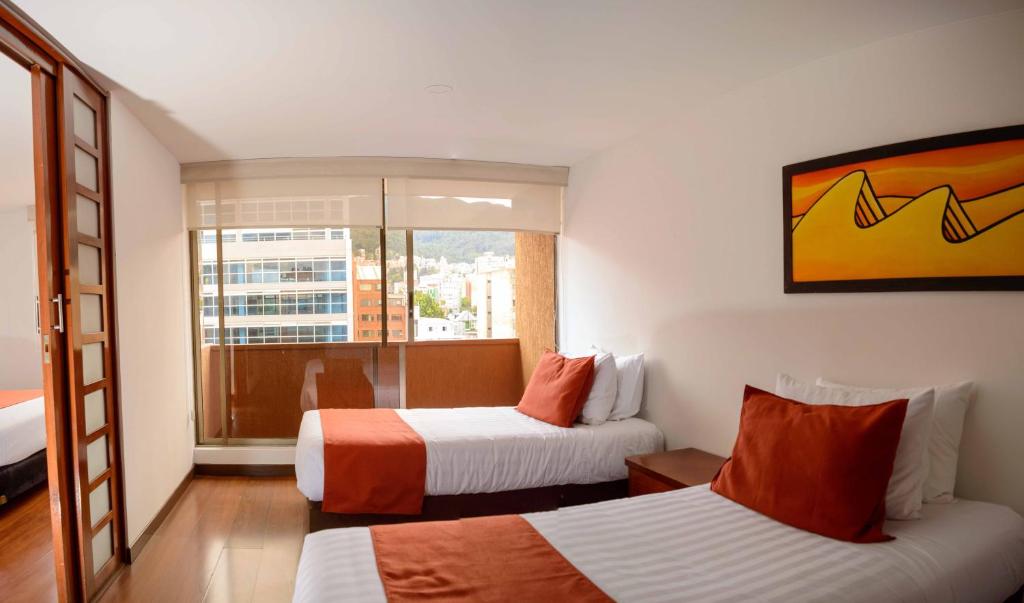Postel nebo postele na pokoji v ubytování Hotel Confort 80 Zona Rosa