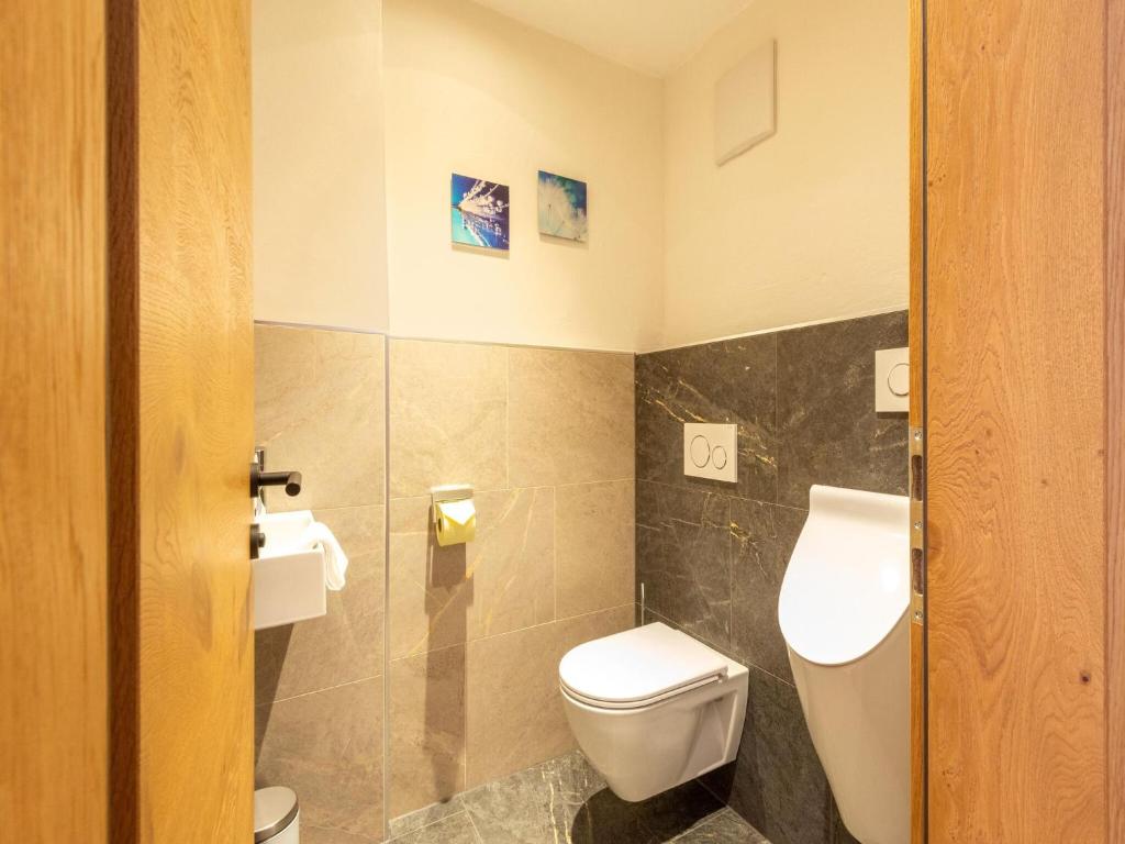 Koupelna v ubytování Apartments Heissangerer