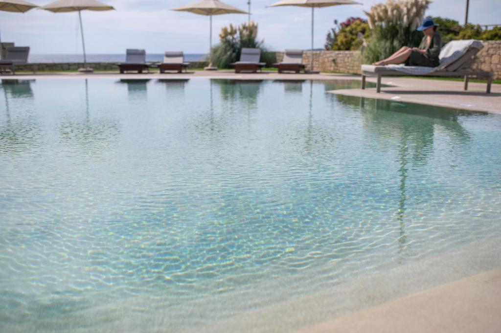 Bazén v ubytovaní Callisto Seaside Homes & Suites alebo v jeho blízkosti
