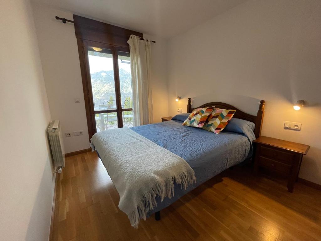 Postel nebo postele na pokoji v ubytování C18 - Alojamiento Mirador de Cerler - Villmor