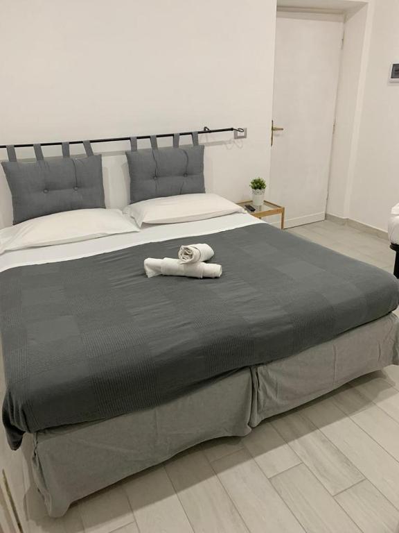 Postel nebo postele na pokoji v ubytování Albergo Abruzzese