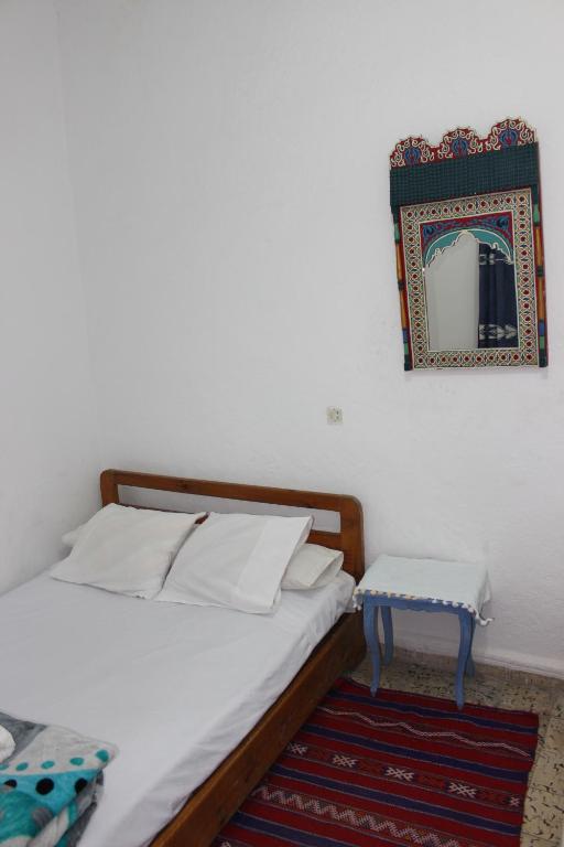 Postel nebo postele na pokoji v ubytování Cordoba Pension