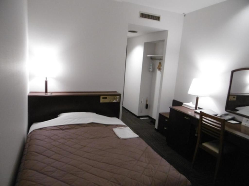 מיטה או מיטות בחדר ב-Urban Hotel Nihonmatsu - Vacation STAY 78328v