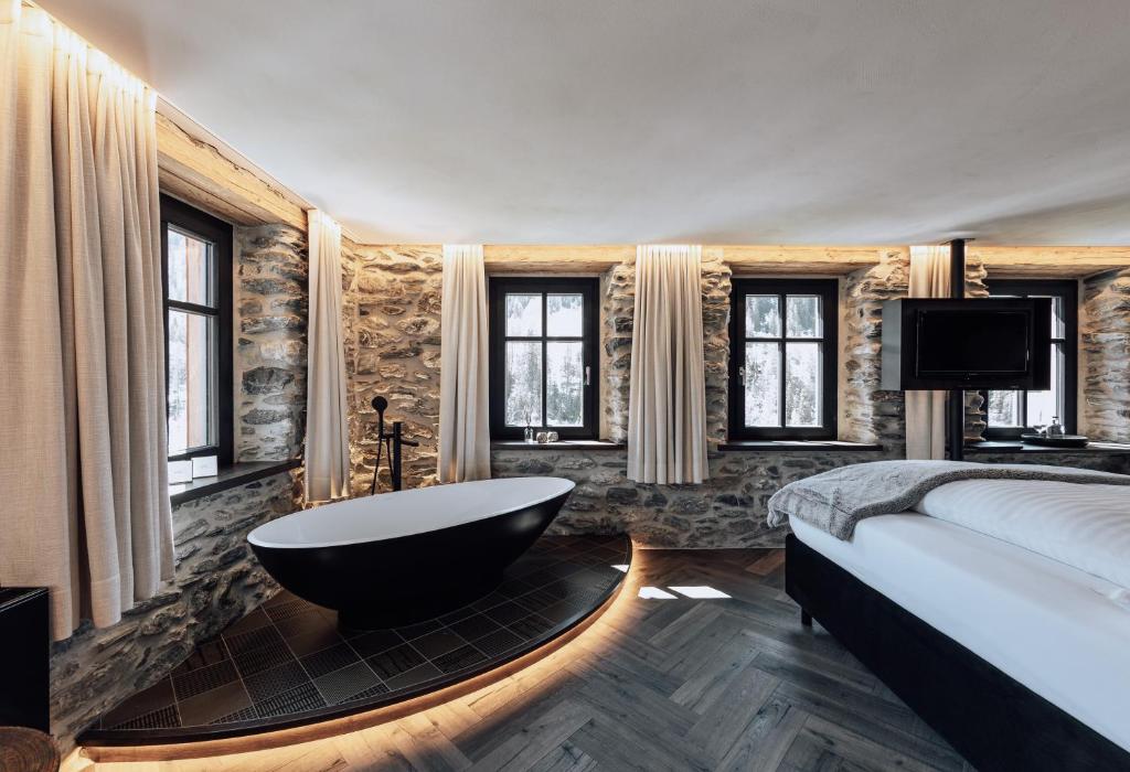 Postel nebo postele na pokoji v ubytování LARET private Boutique Hotel - Adults only