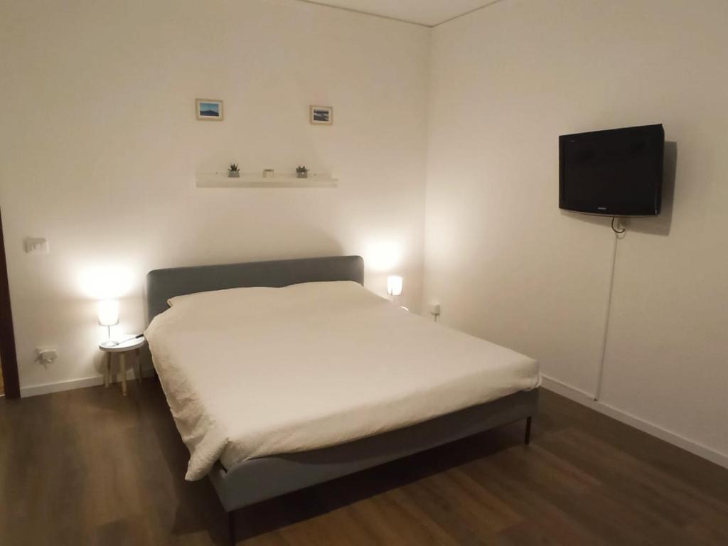 Postel nebo postele na pokoji v ubytování Casa Muci