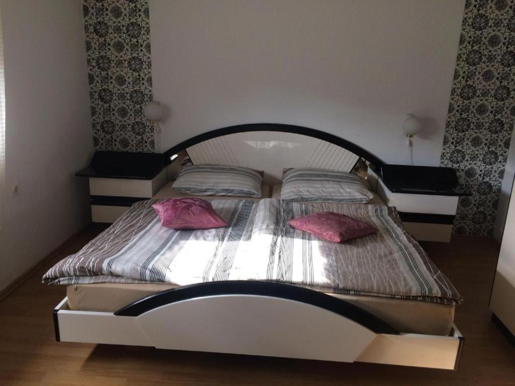 Postel nebo postele na pokoji v ubytování Apartment Ana