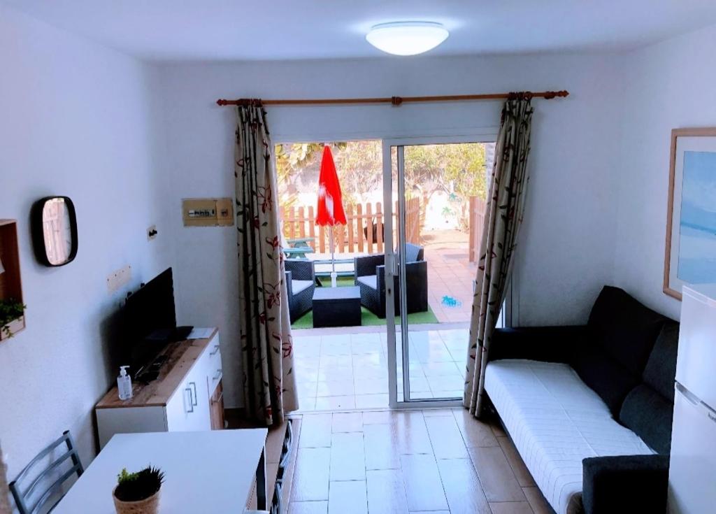 TV a/nebo společenská místnost v ubytování MASPALOMAS GREEN OASIS CLUB playa