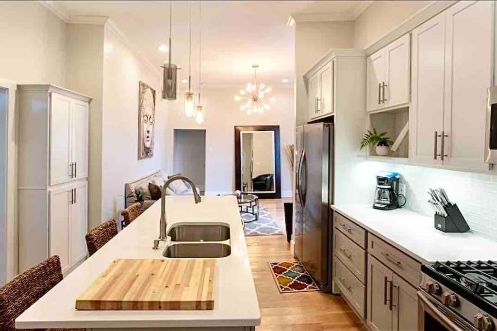 a kitchen with a sink and a counter top at Modern/ parking/Eden Park/near Downtown/ FCC in Cincinnati