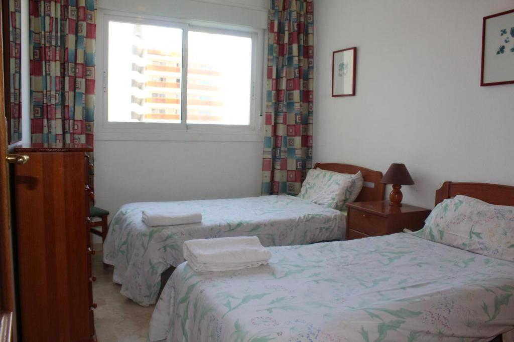Postel nebo postele na pokoji v ubytování Gemelos 22 - Zand Properties
