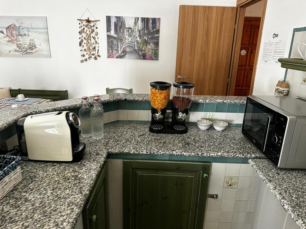 Kuchyň nebo kuchyňský kout v ubytování Beppo's B&B