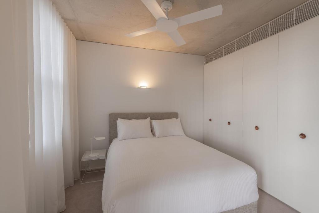 Postel nebo postele na pokoji v ubytování Hotel Ravesis