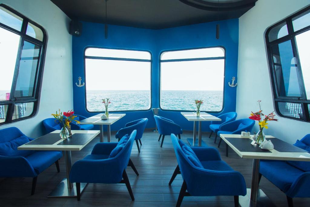 Posezení v ubytování Cap Kivu Hôtel