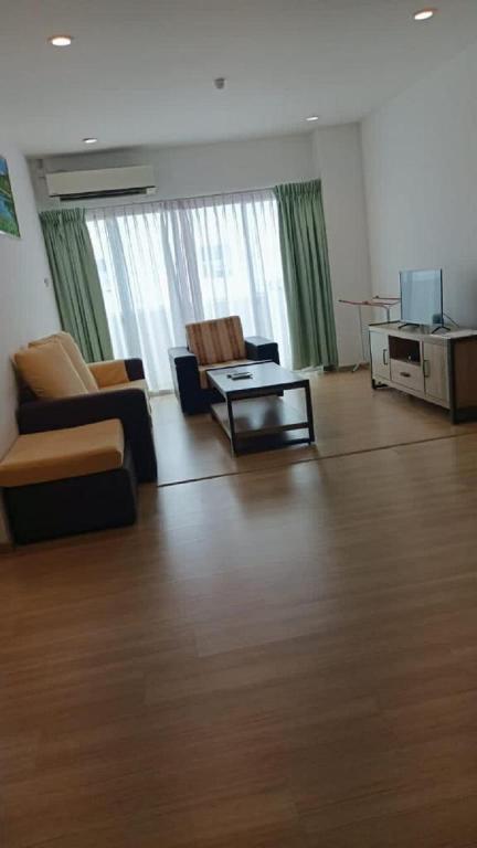 TV a/nebo společenská místnost v ubytování MCITI Suites