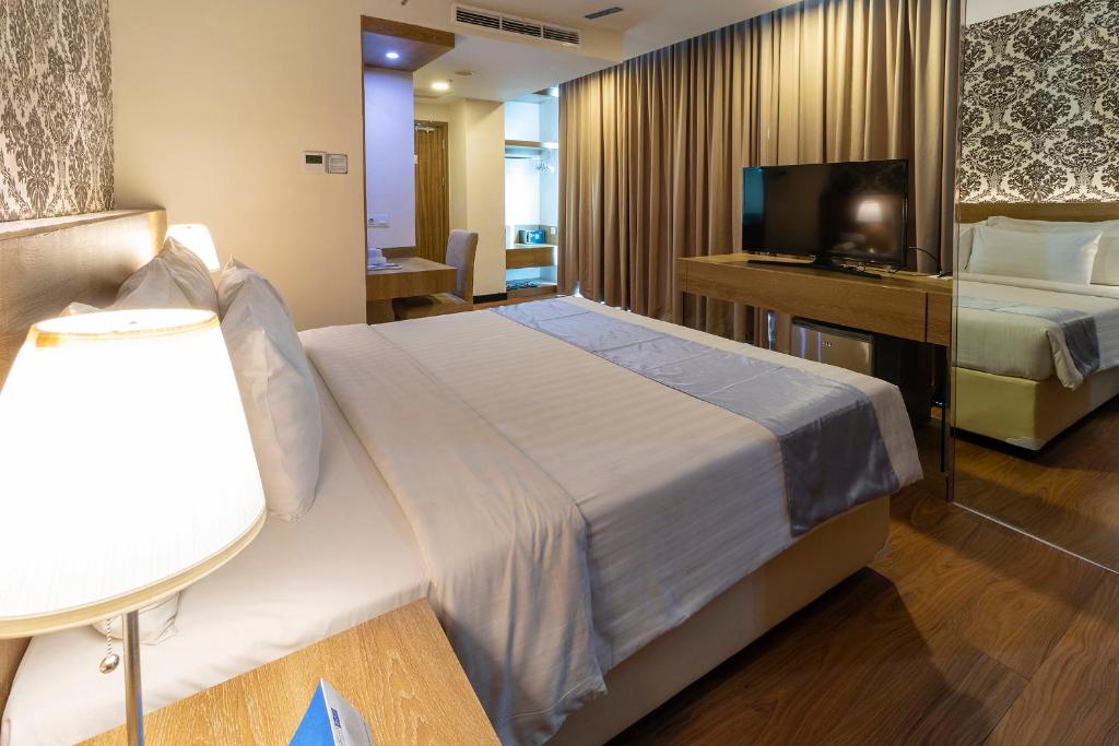 Odua Weston Jambi - Deluxe Room