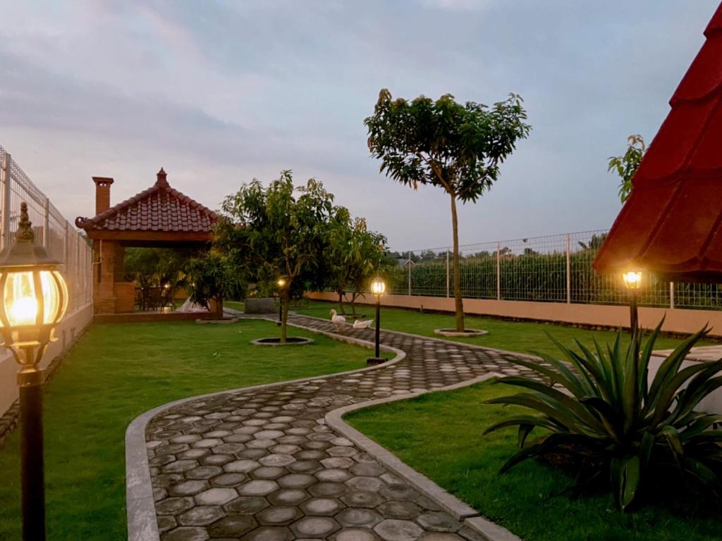 Zahrada ubytování Villa Desa Pehkulon