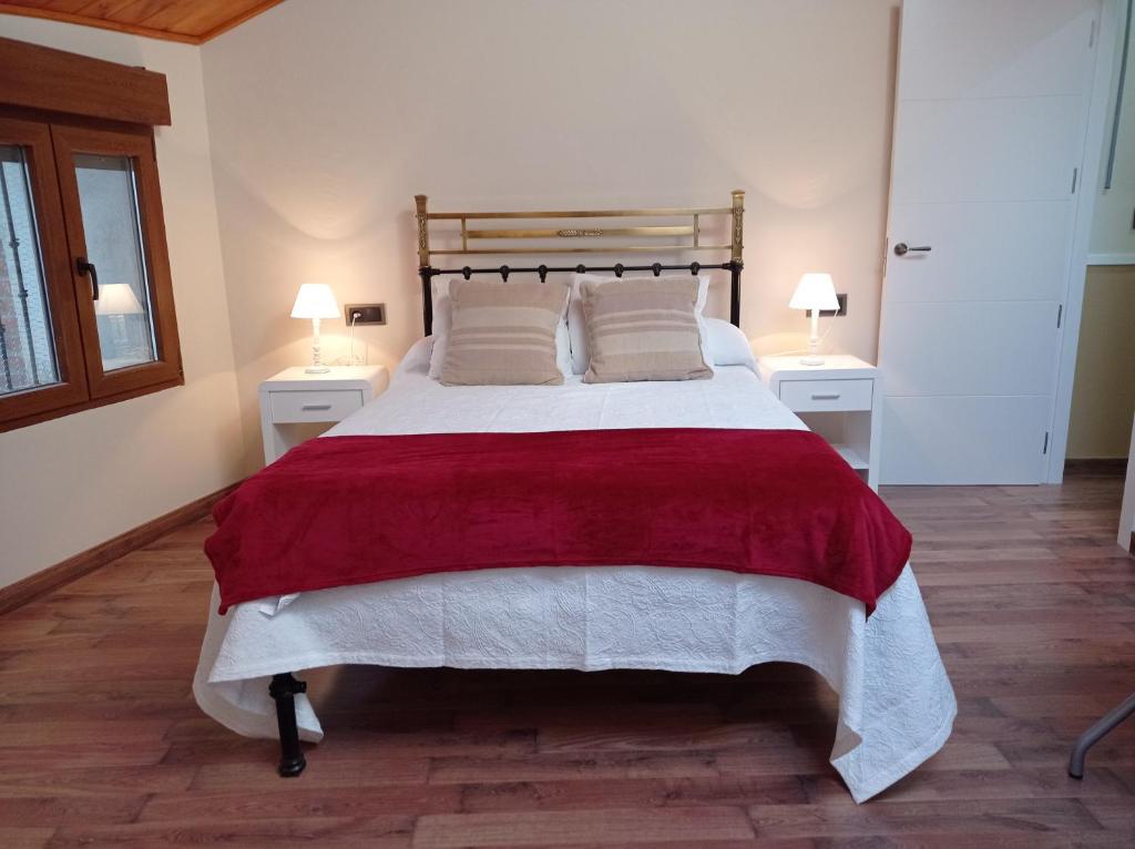 A bed or beds in a room at Magia en el Arco